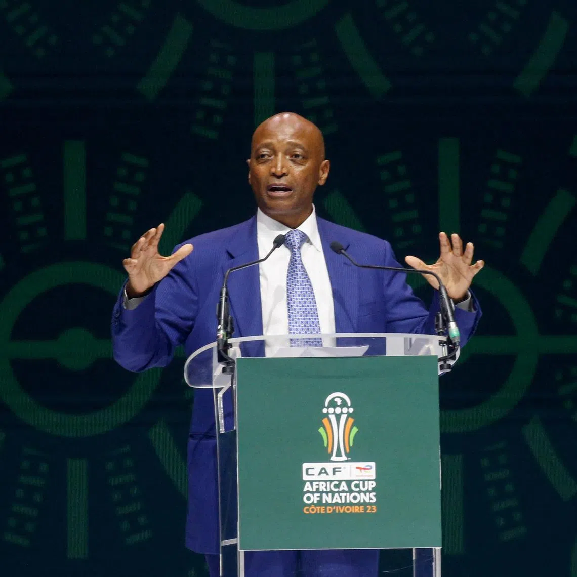 Soccer Football- Africa Cup of Nations draw.- The exhibition center of Abidjan, Ivory Coast - October 12, 2023. Patrice Motsepe, president of CAF (African Football Confederation) speaks during the draw. REUTERS/Luc Gnago