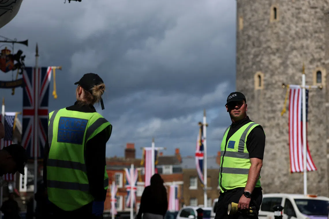 Police officers conduct security searches ahead of the state visit by U.S. President Donald Trump in Windsor, Britain, September 15, 2025. REUTERS/Hannah McKay
