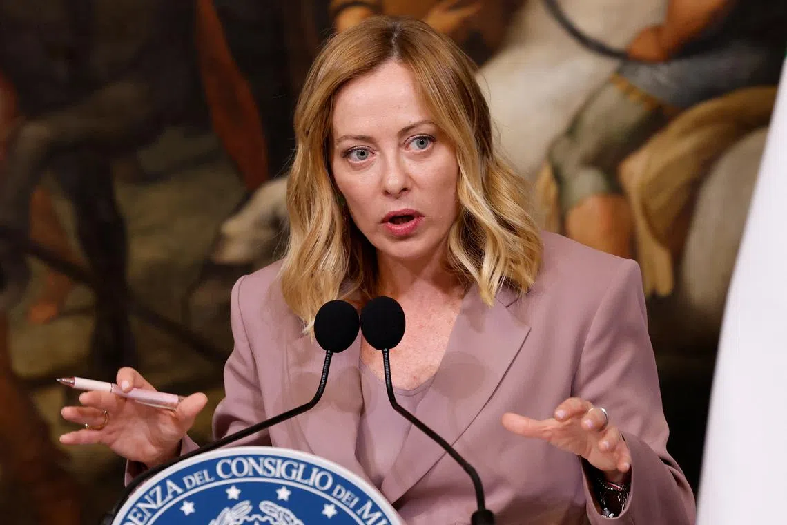 Italian Prime Minister Giorgia Meloni attends a press conference with German Chancellor Friedrich Merz (not pictured) at Chigi Palace in Rome, Italy, May 17, 2025. REUTERS/Remo Casilli/File Photo