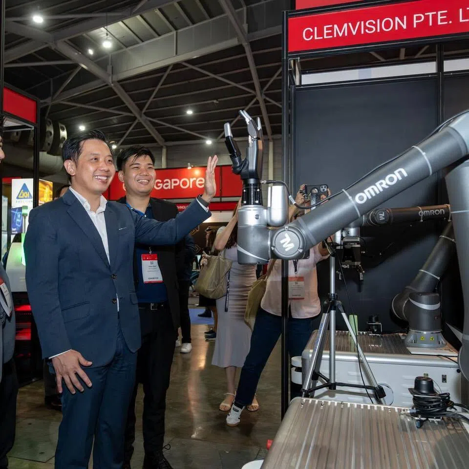 Minister of State for Trade and Industry Alvin Tan (2nd from left) at the Industrial Transformation Asia-Pacific 2025.