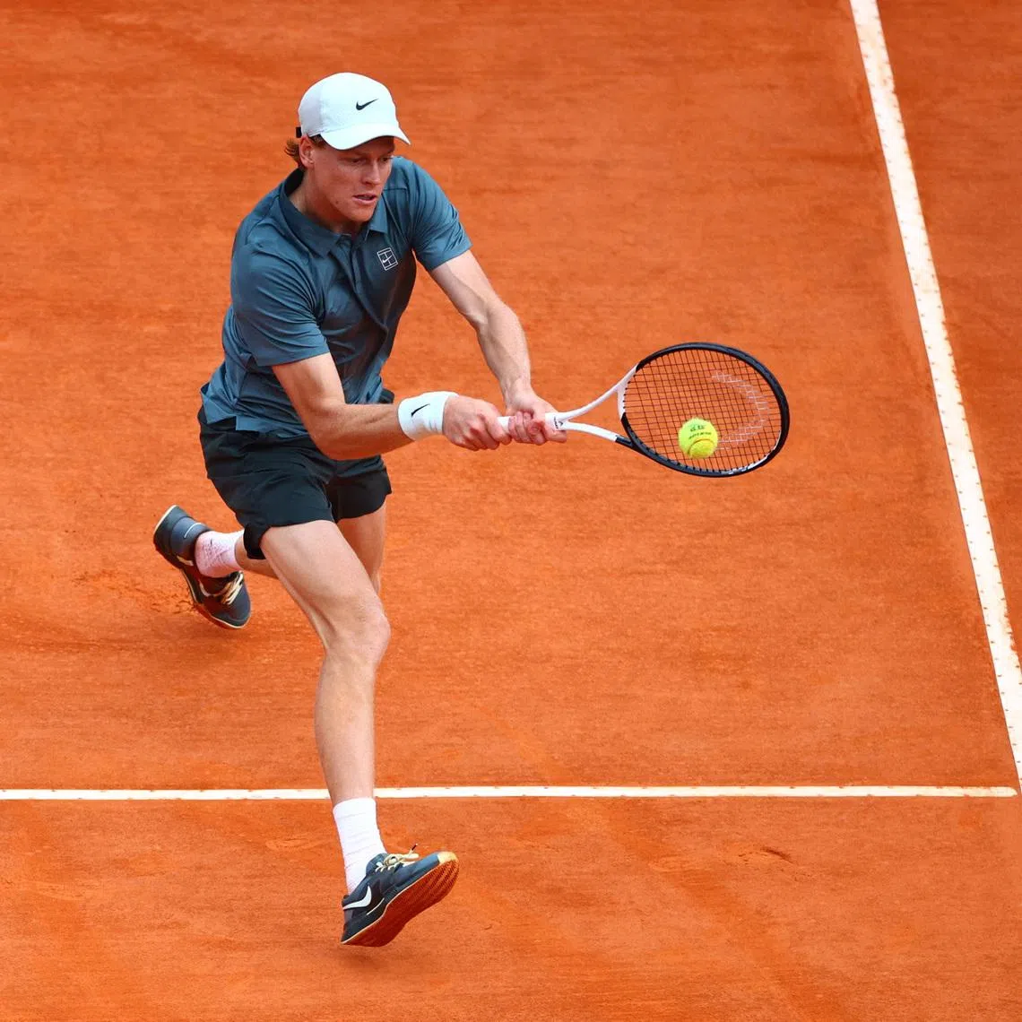 Tennis - ATP Masters 1000 - Monte Carlo Masters - Monte Carlo Country Club, Roquebrune-Cap-Martin, France - April 12, 2026 Italy's Jannik Sinner in action during his final match against Spain's Carlos Alcaraz REUTERS/Manon Cruz