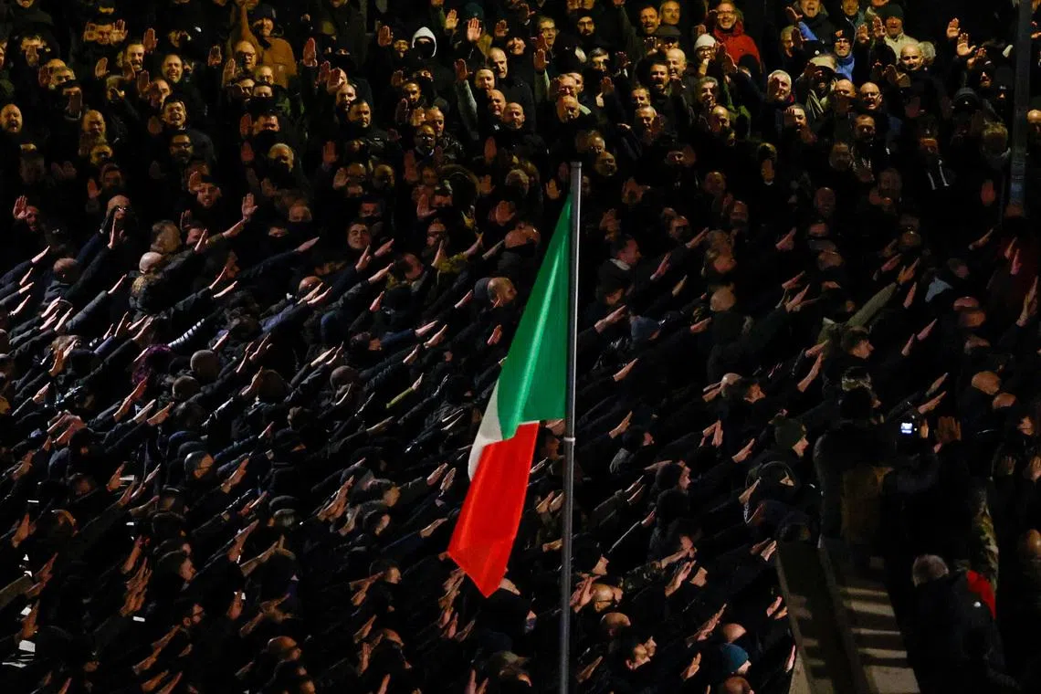 Neo-fascists gesture during a commemoration of the Acca Larentia anniversary, an event marking the killings of two far-right activists, that took place on January 7, 1978, in Rome, Italy January 7, 2026. REUTERS/Matteo Minnella