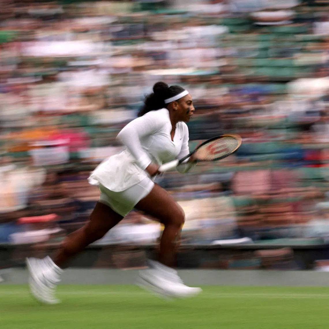 FILE PHOTO: Tennis - Wimbledon - All England Lawn Tennis and Croquet Club, London, Britain - June 28, 2022 Serena Williams of the U.S. in action during her first round match against France's Harmony Tan REUTERS/Matthew Childs/File Photo