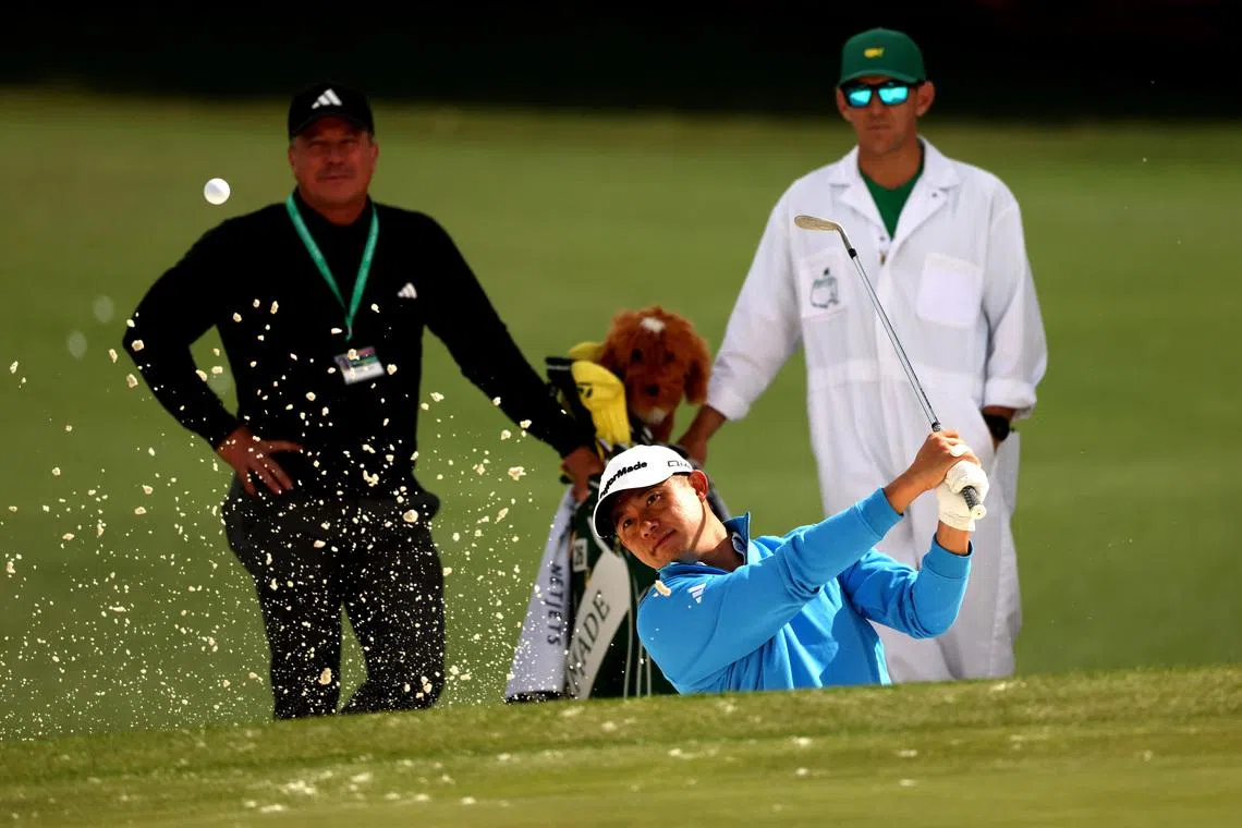 Golf - The Masters - Augusta National Golf Club, Augusta, Georgia, U.S. - April 6, 2026  Collin Morikawa of the U.S. plays out from the bunker on the practice range during a practice round REUTERS/Mike Segar