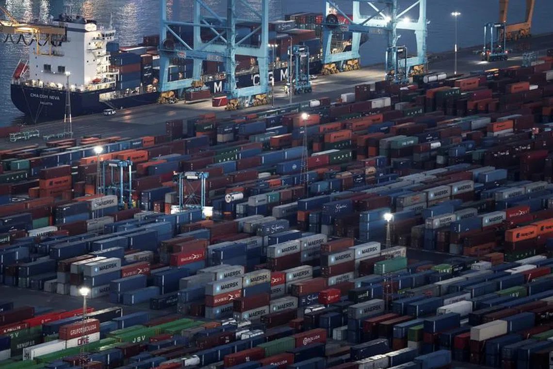 FILE PHOTO: Shipping containers are seen at the port of Barcelona, Spain, June 4, 2022. Picture taken June 4, 2022. REUTERS/Nacho Doce/File photo
