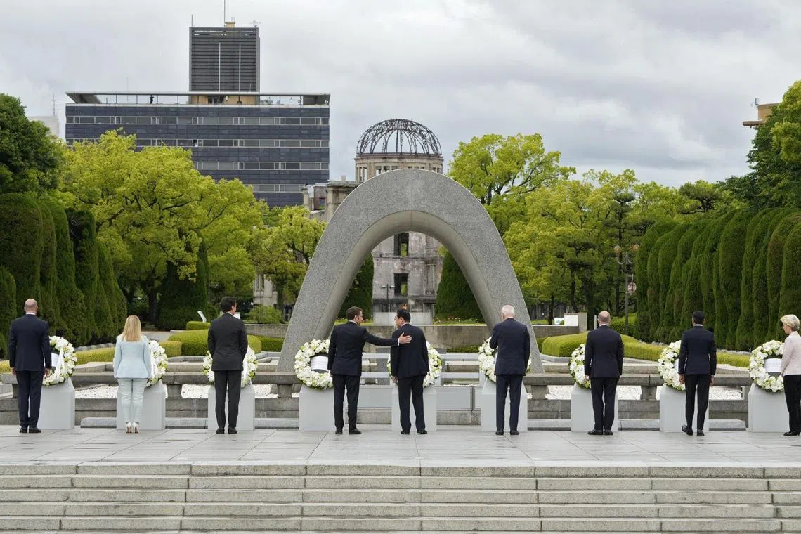 (From left) European Council president Charles Michel, Italian PM Giorgia Meloni, Canadian PM Justin Trudeau, French President Emmanuel Macron, Japanese PM Fumio Kishida, US President Joe Biden, German Chancellor Olaf Scholz, British PM Rishi Sunak, and European Commission President Ursula von der Leyen, attend a wreath-laying ceremony at the Cenotaph for atomic bomb victims in Hiroshima on Friday.