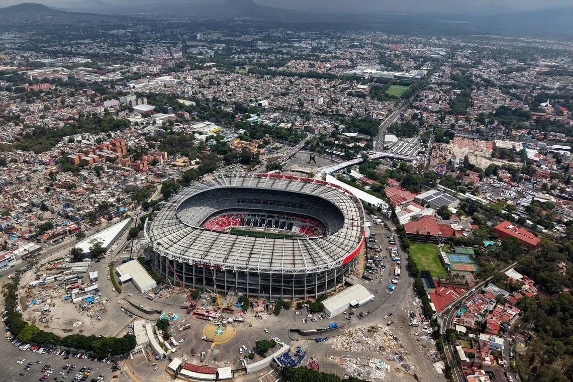 FILE PHOTO: A drone view of the Banorte Stadium, also known as Azteca Stadium, the venue that will host the opening match of the 2026 FIFA World Cup and become the first stadium to hold three World Cups (1970, 1986, 2026), in Mexico City, Mexico, March 17, 2026. REUTERS/Luis Cortes/File Photo