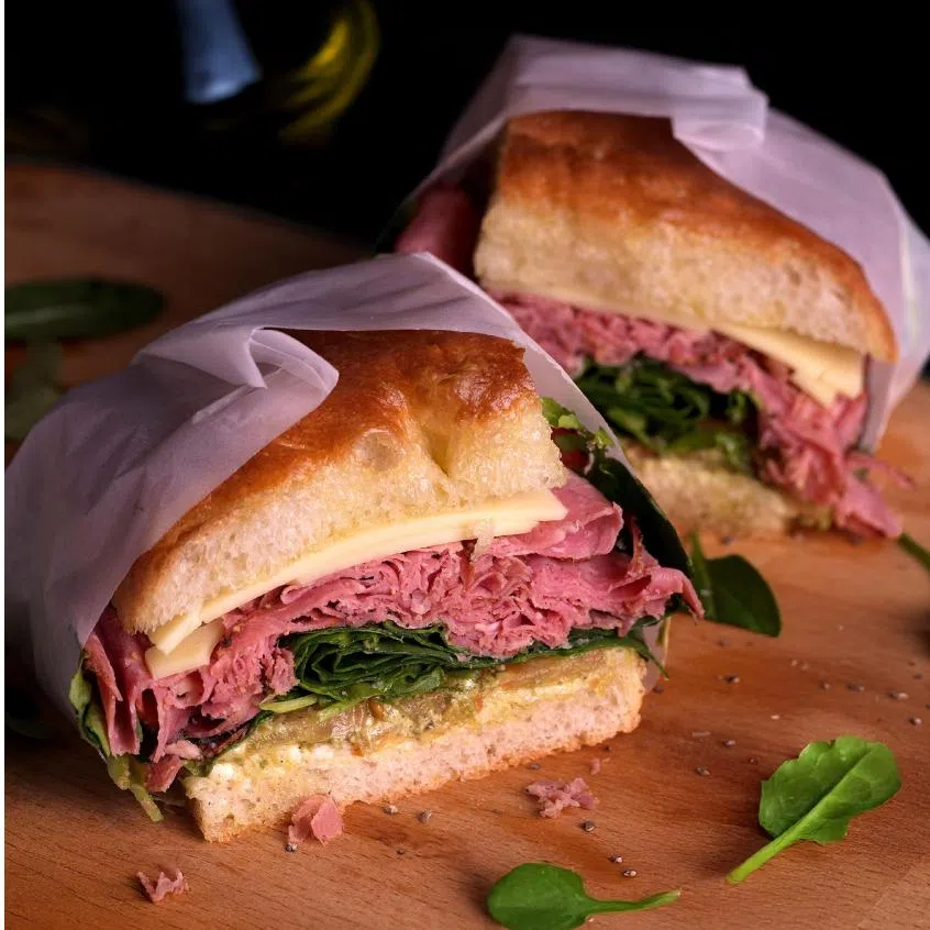 (From left) Cat & the Fiddle's beef pastrami schiacciata sandwich, Mamma Mia Focaccia's 'Nduja sandwich.