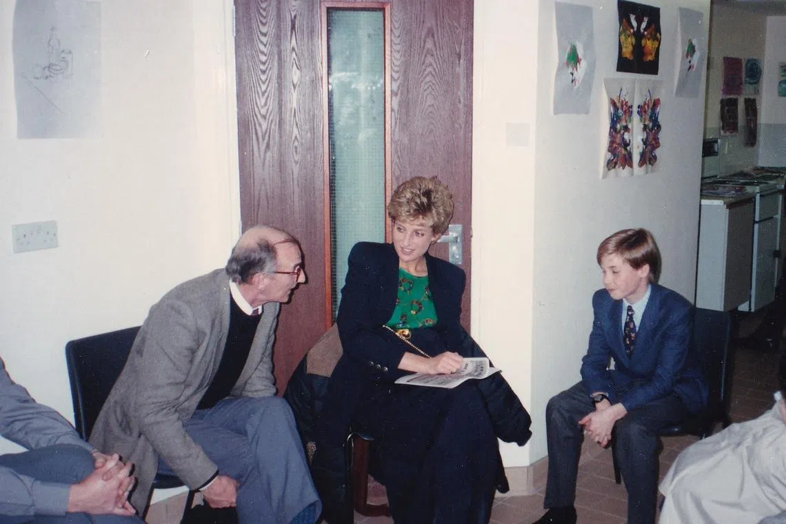 Britain's Diana, Princess of Wales and her son Prince William visit The Passage in London, Britain December 14, 1993 in this handout image. The Passage/Handout via REUTERS/File Photo