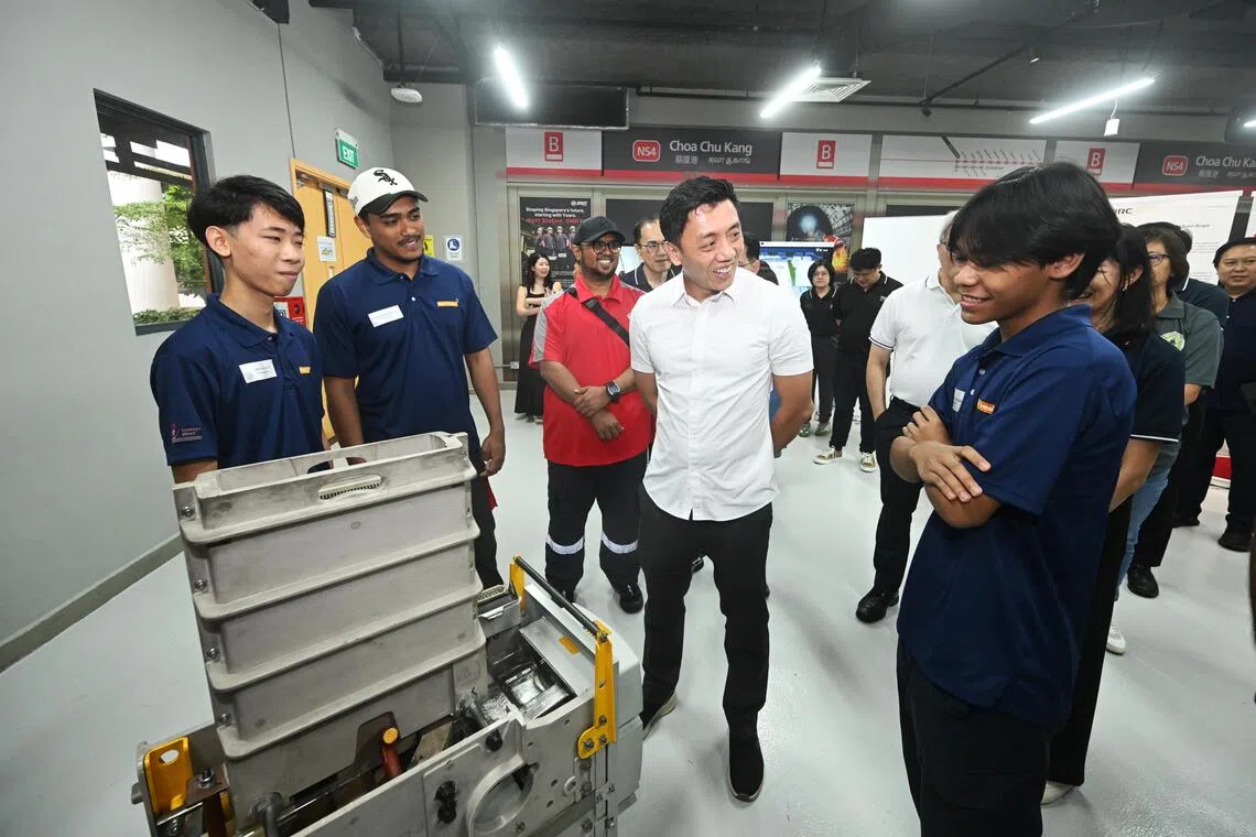 Transport Minister Jeffrey Siow (centre) at the Singapore BusTech and RailTech Grand Challenge at ITE College West on Oct 24.