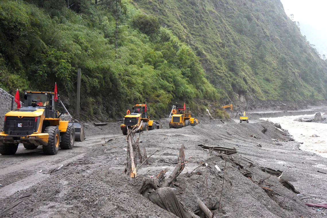 China restores road access to Tibet disaster zone as search intensifies
