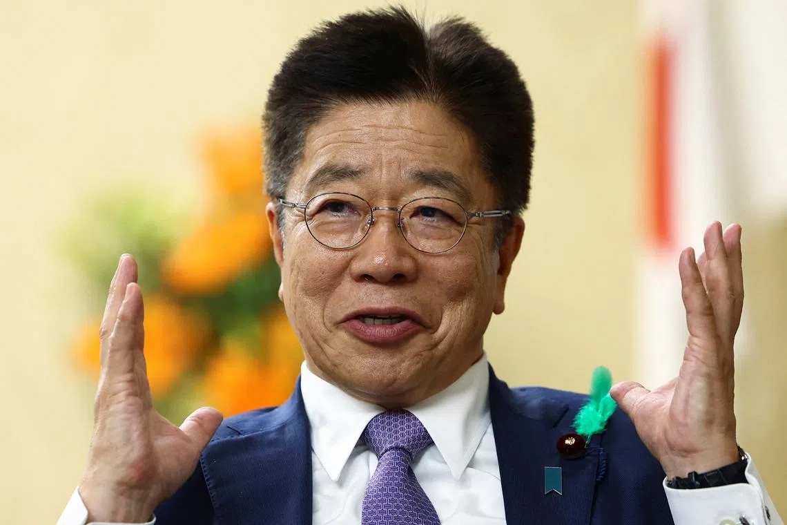 FILE PHOTO: Japan's Finance Minister Katsunobu Kato speaks during an interview with Reuters at the Finance Ministry in Tokyo, Japan April 17, 2025.  REUTERS/Issei Kato/File Photo