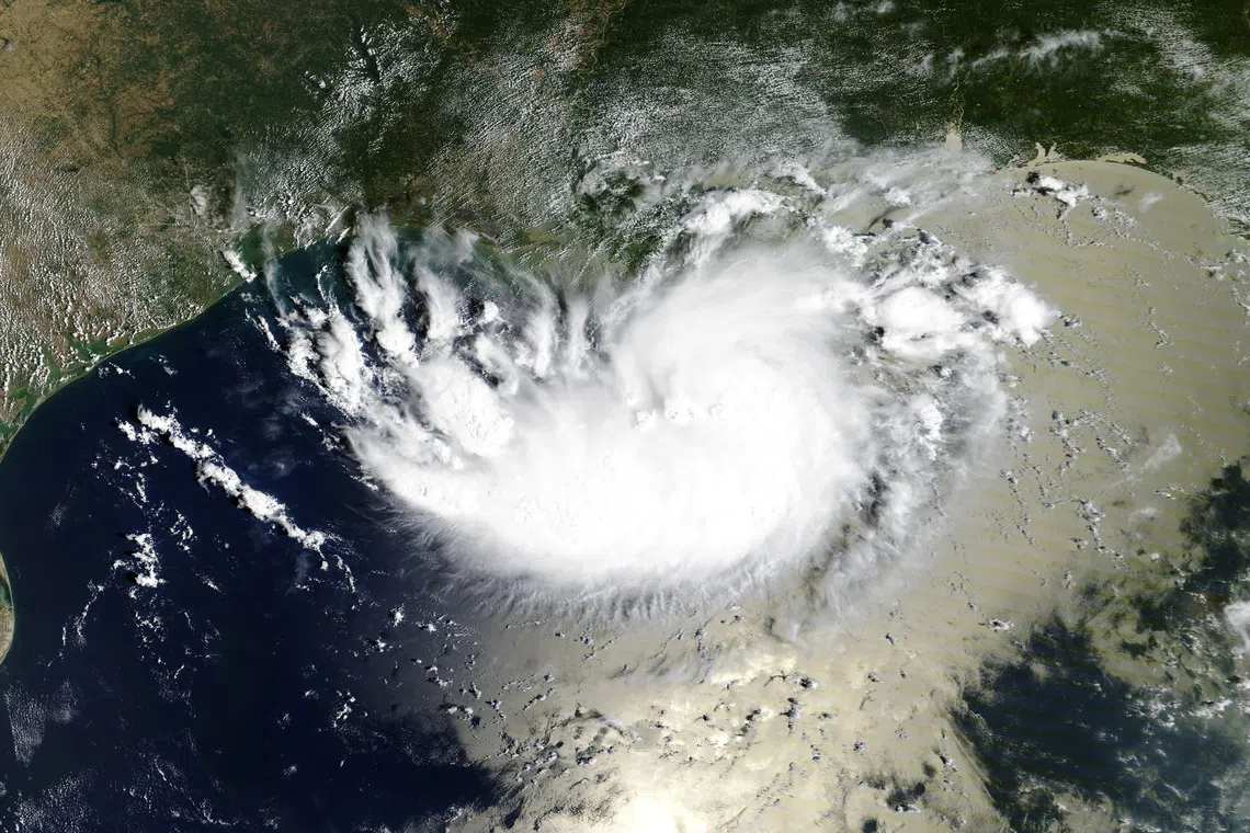 A satellite image shows Tropical Storm Edouard over the Gulf of Mexico, August 31, 2026. NASA WORLDVIEW/Handout via REUTERS