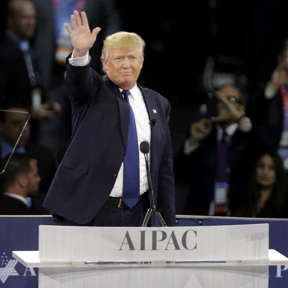 FILE PHOTO: Republican U.S. presidential candidate Donald Trump waves after addressing the American Israel Public Affairs Committee (AIPAC) afternoon general session in Washington March 21, 2016.REUTERS/Joshua Roberts/File Photo