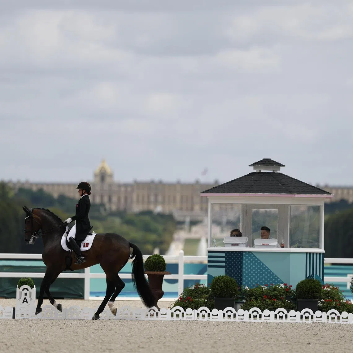 epa11522413 Catherine Laudrup-Dufour of Denmark riding Freestyle competes in the Dressage Team Grand Prix of the Equestrian Dressage competitions in the Paris 2024 Olympic Games, at the Chateau de Versailles in Versailles, France, 03 August 2024.  EPA-EFE/CAROLINE BREHMAN