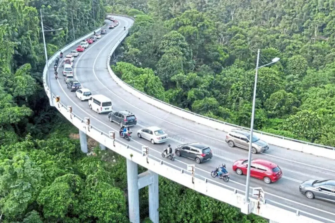 The morning rush has slowed to a crawl as all vehicles are funnelled through Jalan Teluk Kumbar, the only remaining road between Balik Pulau and Bayan Lepas.