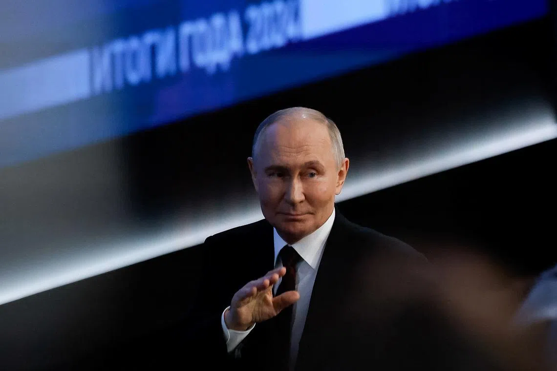 Russia's President Vladimir Putin gestures as he leaves the hall at the end of his annual end-of-year press conference and phone-in, in Moscow, Russia December 19, 2024. REUTERS/Maxim Shemetov