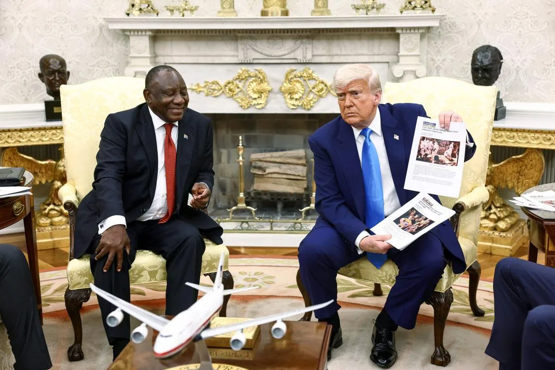 US President Donald Trump (right) meeting South African President Cyril Ramaphosa at the White House on May 21.