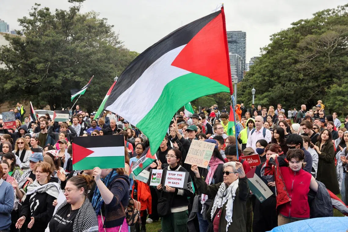 FILE PHOTO: Members of the Palestine Action Group gather ahead of a rally, amid the ongoing conflict between Israel and the Palestinian Islamist group Hamas, in Sydney, Australia May 3, 2024. REUTERS/Alasdair Pal/File Photo