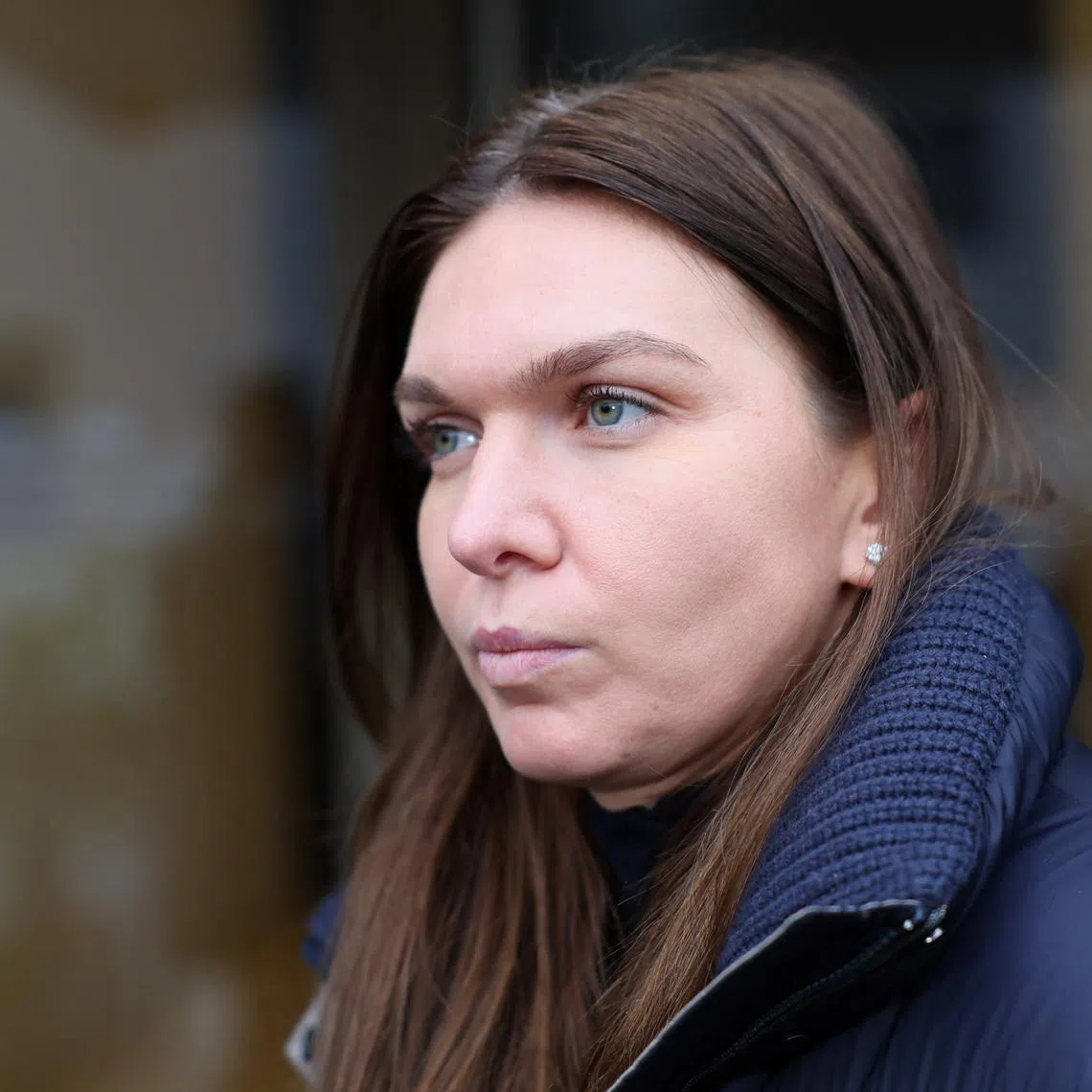 FILE PHOTO: Tennis player Simona Halep of Romania speaks to the media, on the hearing day of a doping case against her at the Court of Arbitration for Sport (CAS) in Lausanne, Switzerland February 9, 2024. REUTERS/Denis Balibouse/File Photo
