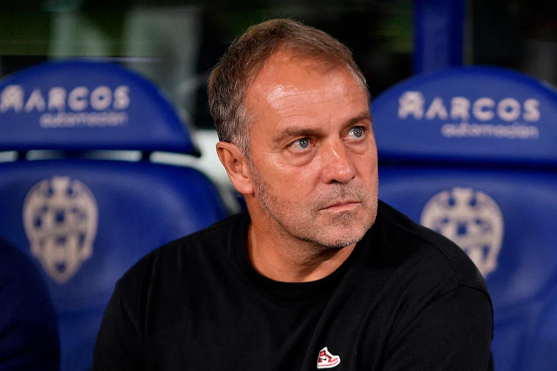 FILE PHOTO: Soccer Football - LaLiga - Levante v FC Barcelona - Esatdio Ciudad de Valencia, Valencia, Spain - August 23, 2025 FC Barcelona coach Hansi Flick before the match REUTERS/Pablo Morano/File Photo