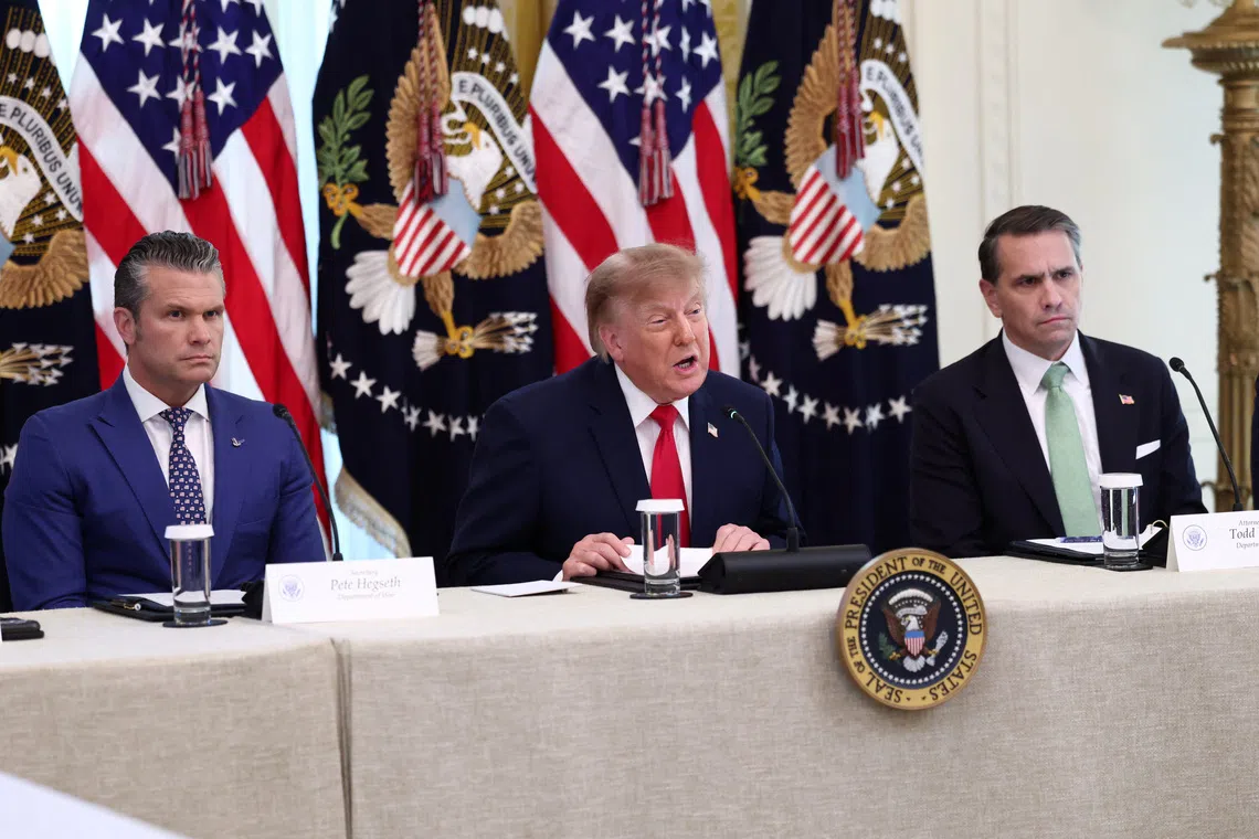 US President Donald Trump speaks on Oct 21 about foreign fraudulent cryptocurrency investment schemes and his administration's efforts to prevent them.
