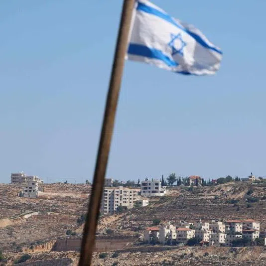An Israeli flag installed by settlers seen in the al-Tireh neighbourhood at the western entrance to Ramallah, in the Israeli-occupied West Bank.