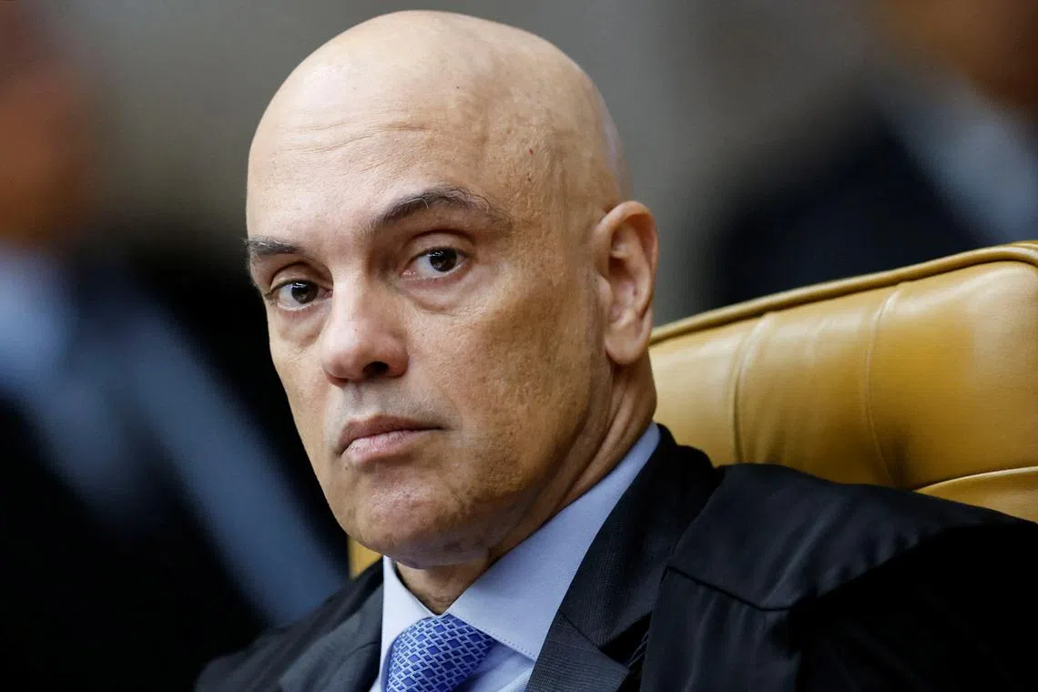 FILE PHOTO: Brazil's Supreme Court Judge Alexandre de Moraes attends a session of the Supreme Court in Brasilia, Brazil, November 27, 2024. REUTERS/Adriano Machado/File Photo