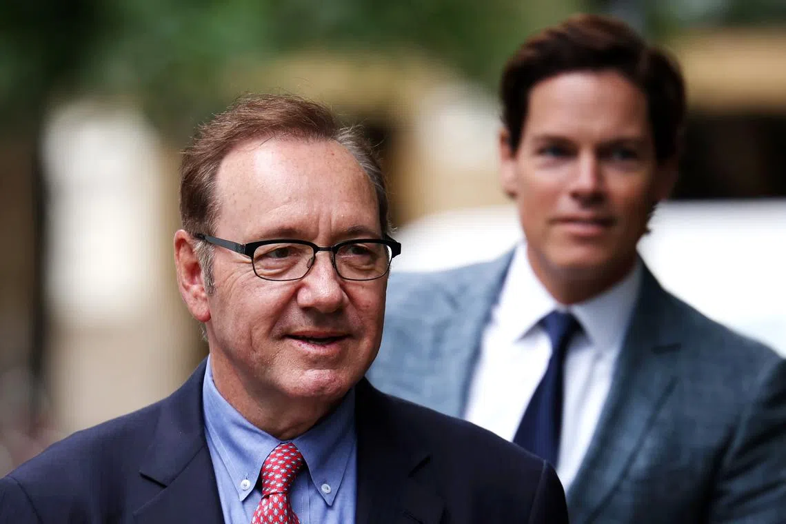 Actor Kevin Spacey (left) arrives at Southwark Crown Court in London, on July 11, 2023.