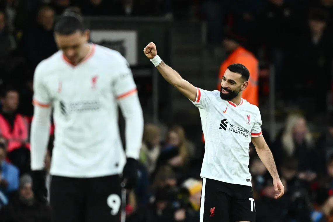 Liverpool's Mohamed Salah celebrates scoring their second goal against Bournemouth.