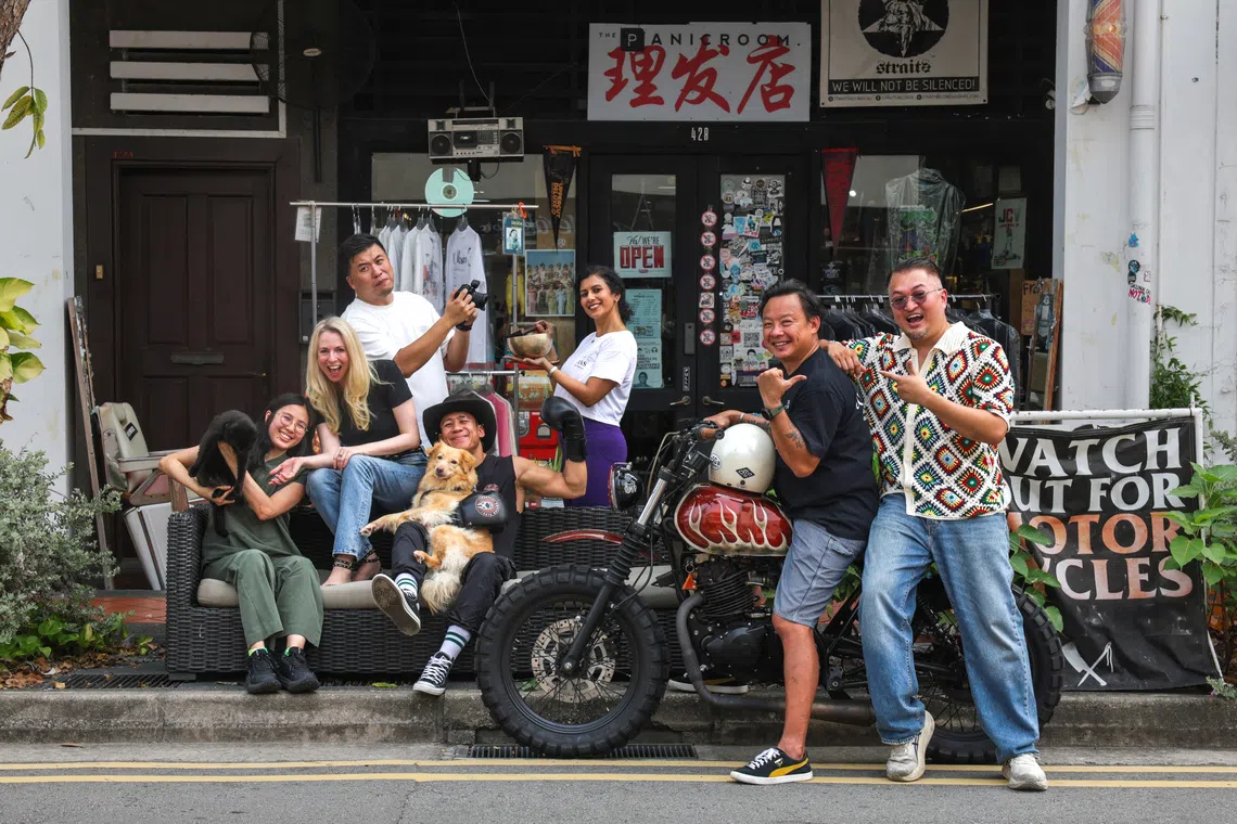 (From left) Dr Serena Shum, Meraki Vets; Hannah James, Head of Place-making, Katong-Joo Chiat Business Association; Edmund Sim, Twenty Blinks Studio; Danny Fleury, Spartans Boxing Club, (wearing cowboy hat); Archana Amlapure, Ojas Yoga & Wellness (holding the sound bowl); Benjamin Tan, Creo Customs (on the motorbike); and Edmond Wong, President, Katong-Joo Chiat Business Association.