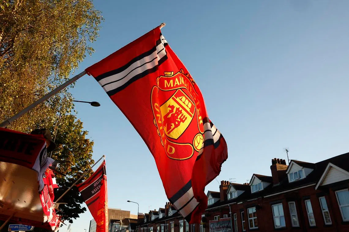 FILE PHOTO: Soccer Football - Carabao Cup - Third Round - Manchester United v Barnsley - Old Trafford, Manchester, Britain - September 17, 2024 General view of flag outside the stadium before the match Action Images via Reuters/Jason Cairnduff/ File Photo