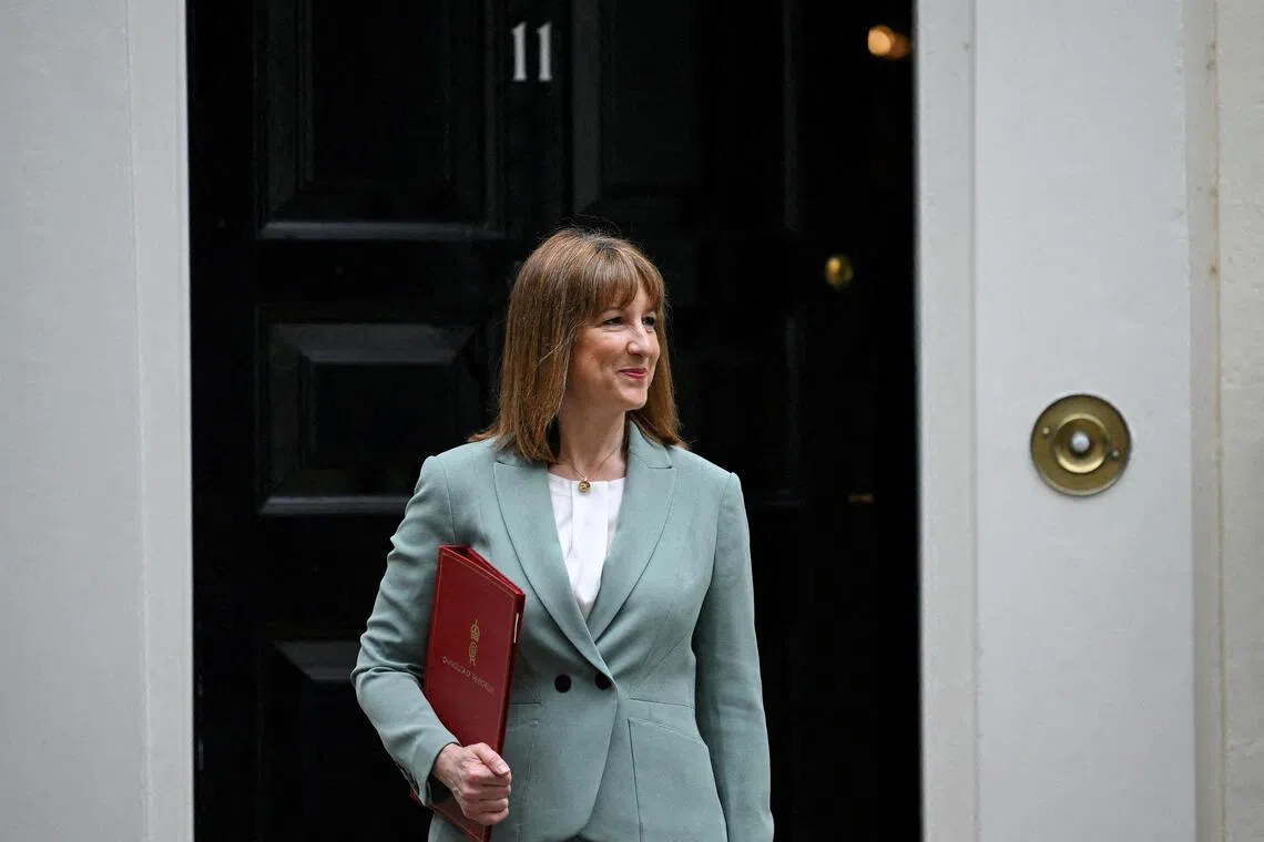 FILE PHOTO: FILE PHOTO: Britain's Chancellor of the Exchequer Rachel Reeves leaves 11 Downing Street, ahead of presenting the Spending Review to Parliament, in London, Britain, June 11, 2025. REUTERS/Jaimi Joy/File Photo/File Photo