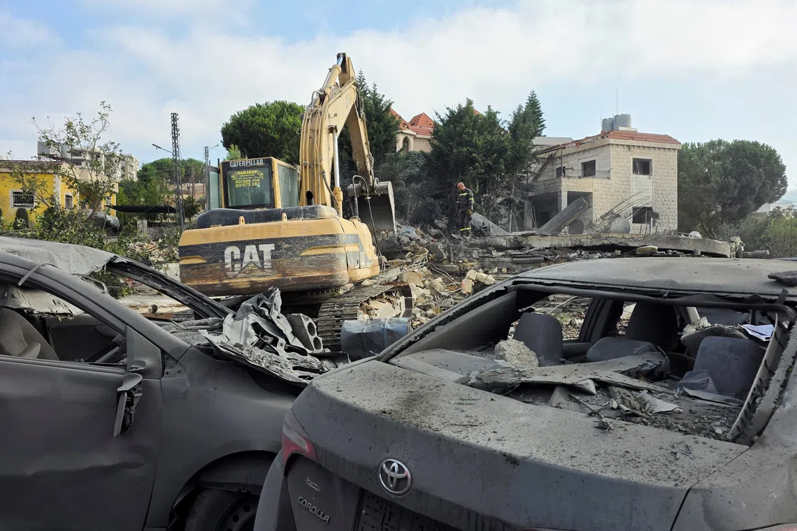Heavy machinery operates at the site of an Israeli strike, in Kfar Rumman, Lebanon, September 7, 2026. Picture taken with a mobile phone. REUTERS/Stringer