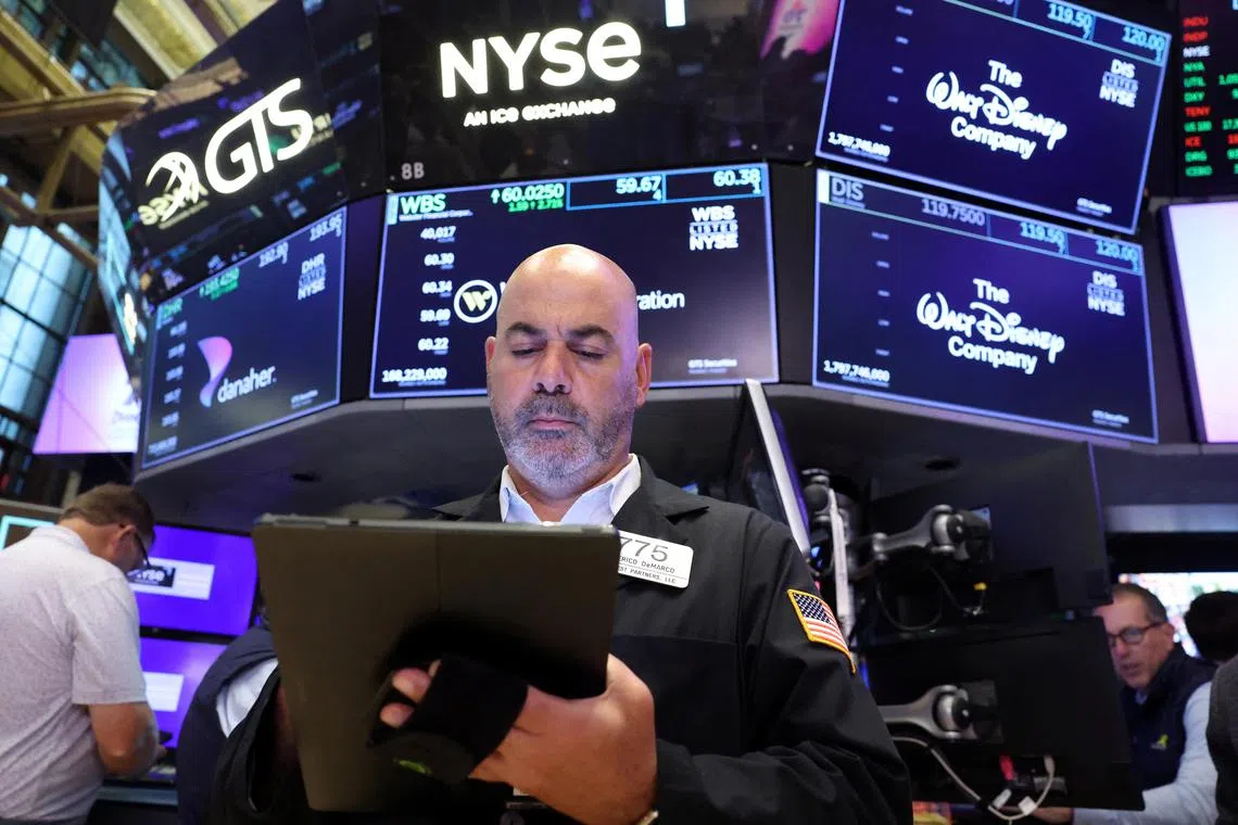 Traders working on the floor of the New York Stock Exchange, in New York City, on July 17.    
