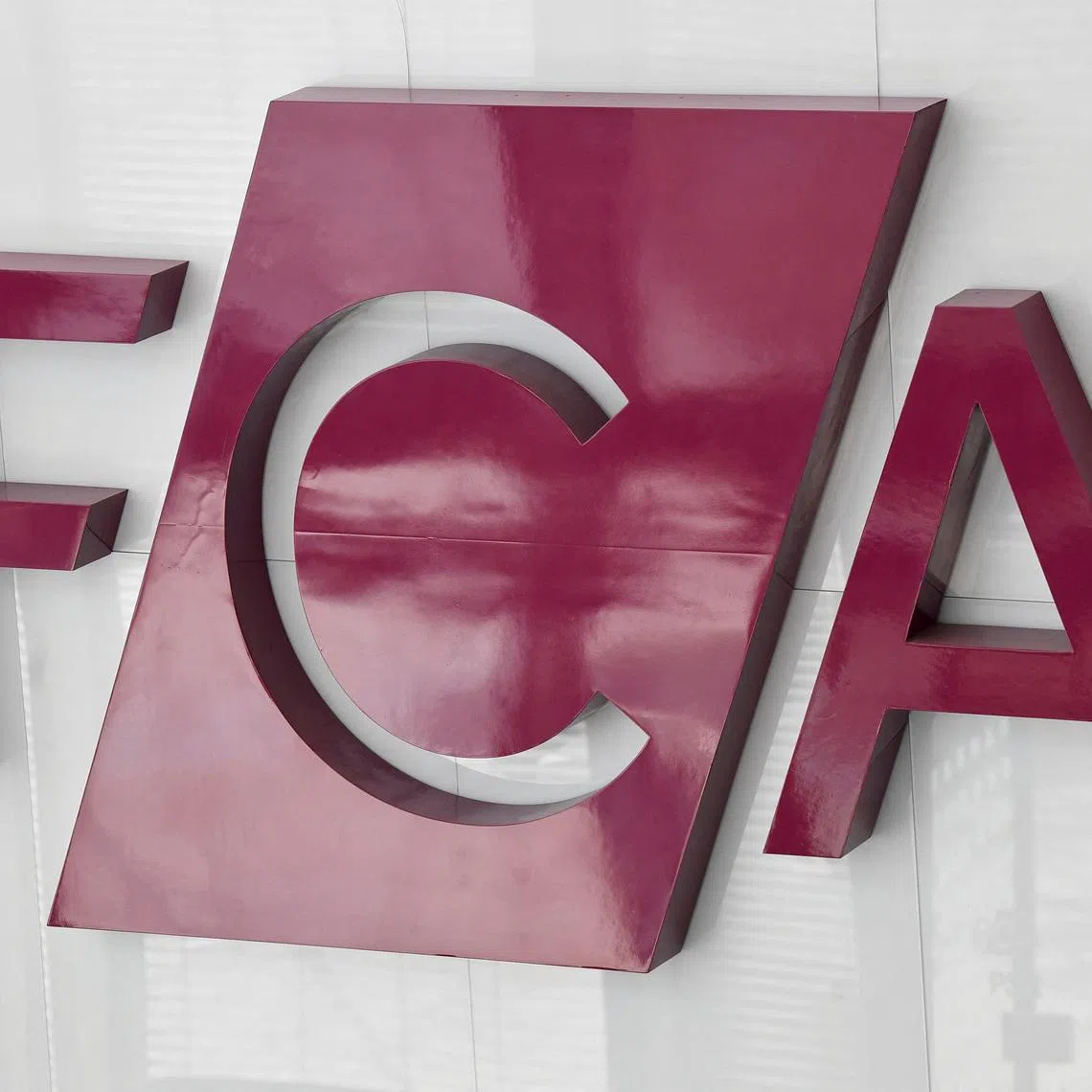 FILE PHOTO: Signage is seen for the FCA (Financial Conduct Authority), the UK's financial regulatory body, at their head offices in London, Britain March 10, 2022. REUTERS/Toby Melville/File Photo