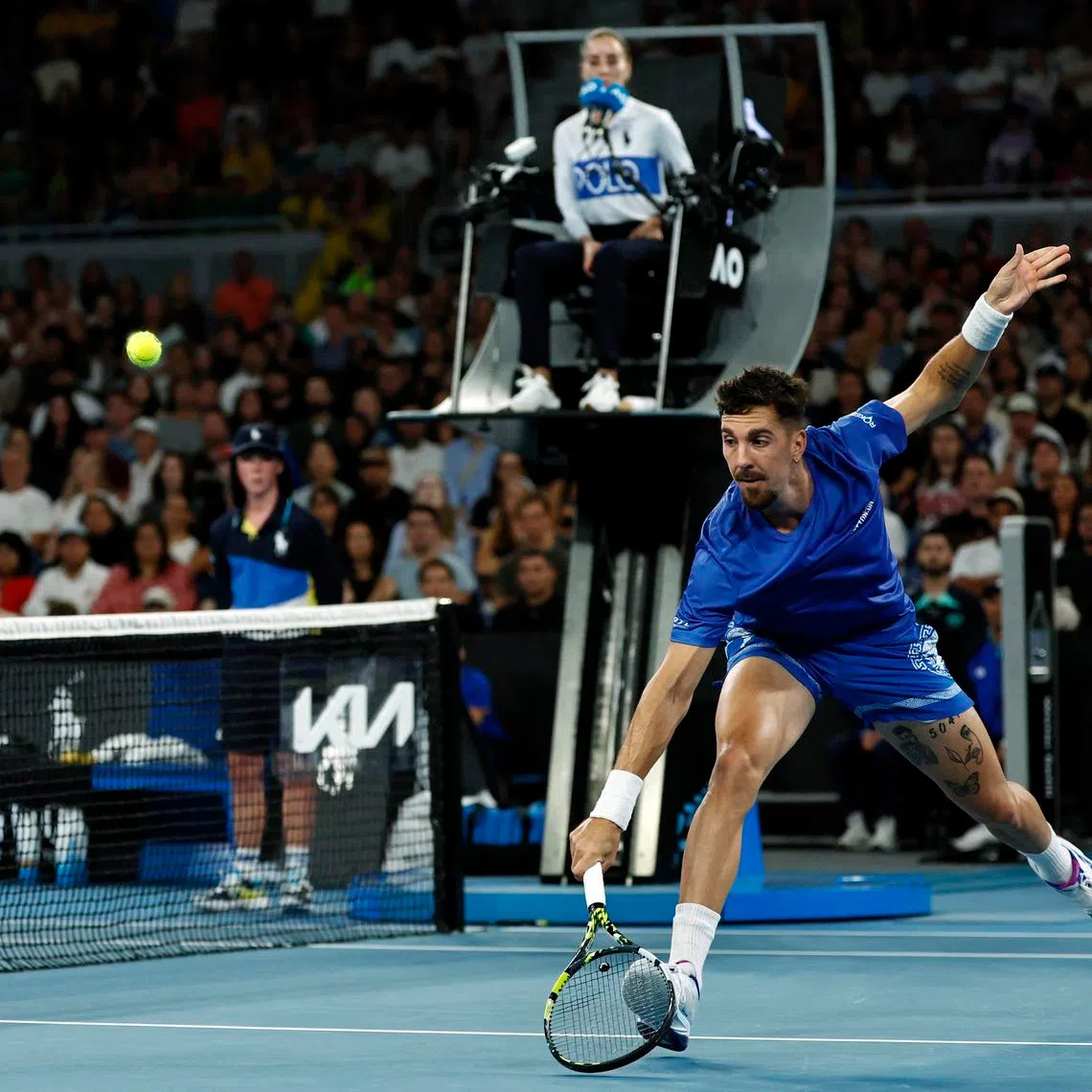 Tennis - Australian Open - Melbourne Park, Melbourne, Australia - January 15, 2025 Australia's Thanasi Kokkinakis in action during his second round match against Britain's Jack Draper REUTERS/Tingshu Wang