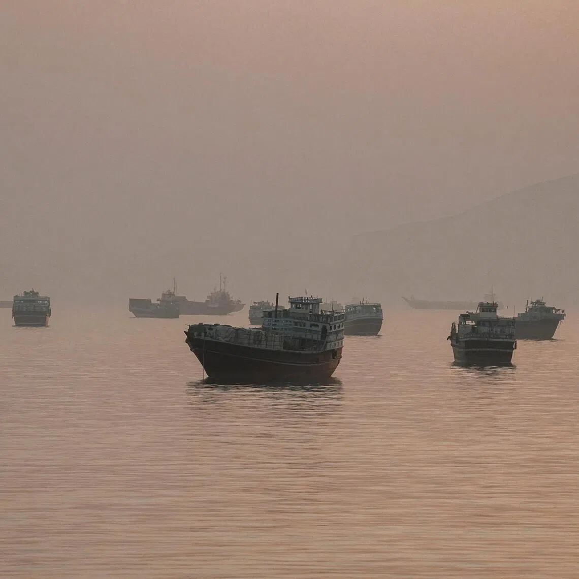 Vessels anchored in the Strait of Hormuz, as seen from Musandam, Oman, on June 3.
