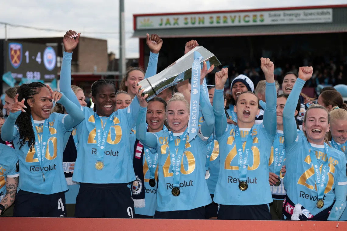 FILE PHOTO: Soccer Football - Women's Super League - West Ham United v Manchester City - Chigwell Construction Stadium, London, Britain - May 16, 2026 Manchester City's Alex Greenwood lifts the trophy as she celebrates with teammates after winning the Women's Super League Action Images via Reuters/Paul Childs/File Photo