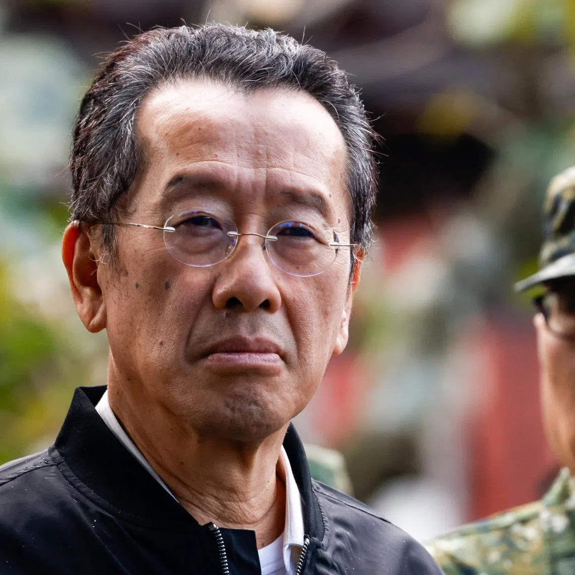 FILE PHOTO: Taiwan Defence Minister Wellington Koo inspects reservists during a training session at Loung Te Industrial Parks Service Center in Yilan, Taiwan December 2, 2025. REUTERS/Ann Wang/File Photo