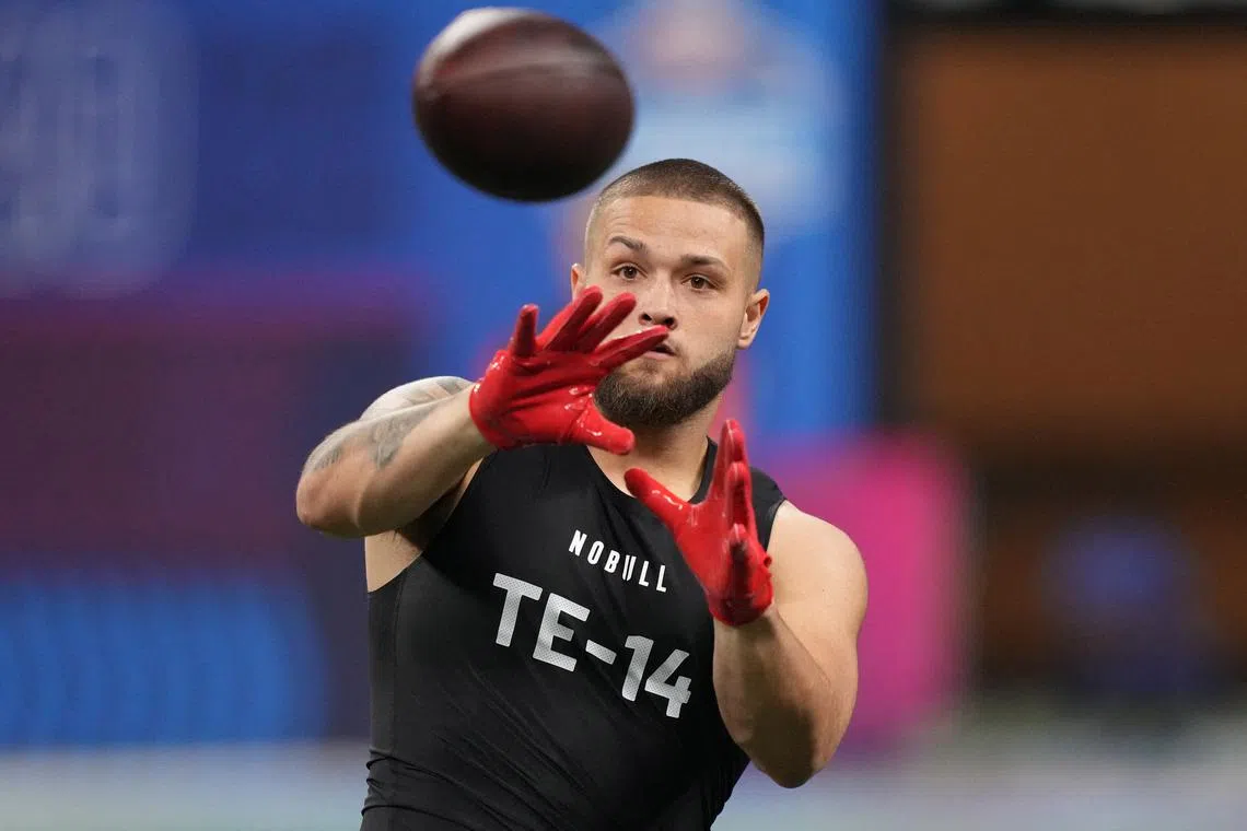 FILE PHOTO: Mar 1, 2024; Indianapolis, IN, USA; Ohio State tight end Cade Stover (TE14) works out during the 2024 NFL Combine at Lucas Oil Stadium. Mandatory Credit: Kirby Lee-USA TODAY Sports/File Photo