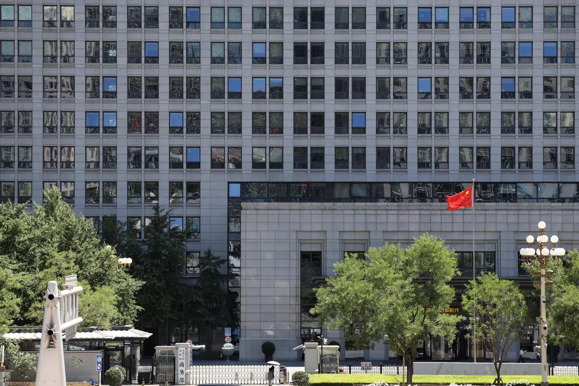 FILE PHOTO: A Chinese flag flutters at the Chinese Ministry of Commerce building in Beijing, China June 4, 2025. REUTERS/Florence Lo/ File Photo