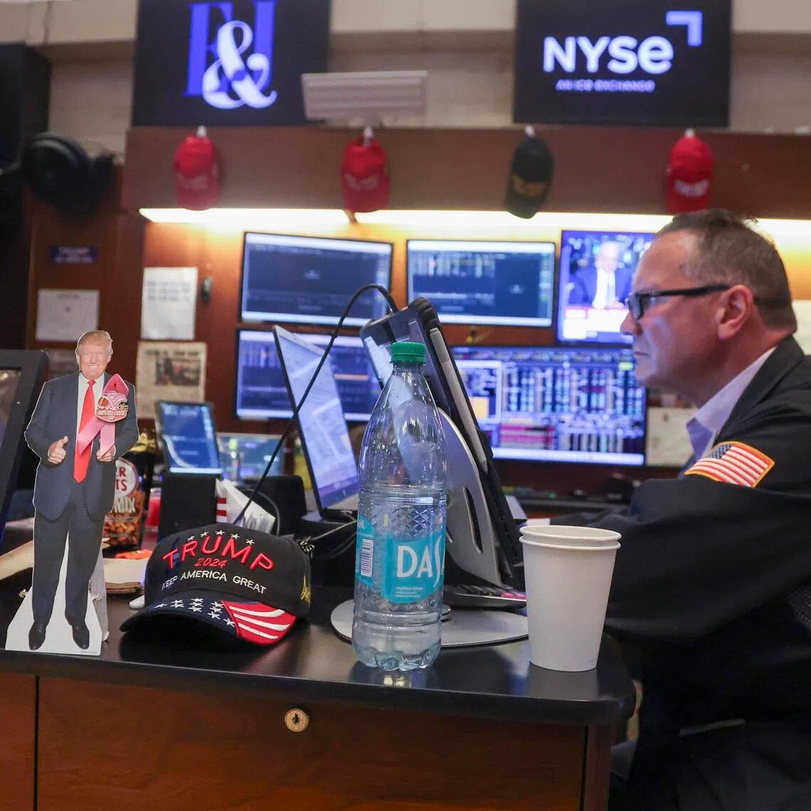 A trader working on the floor of the New York Stock Exchange, in New York City, on Aug 28.