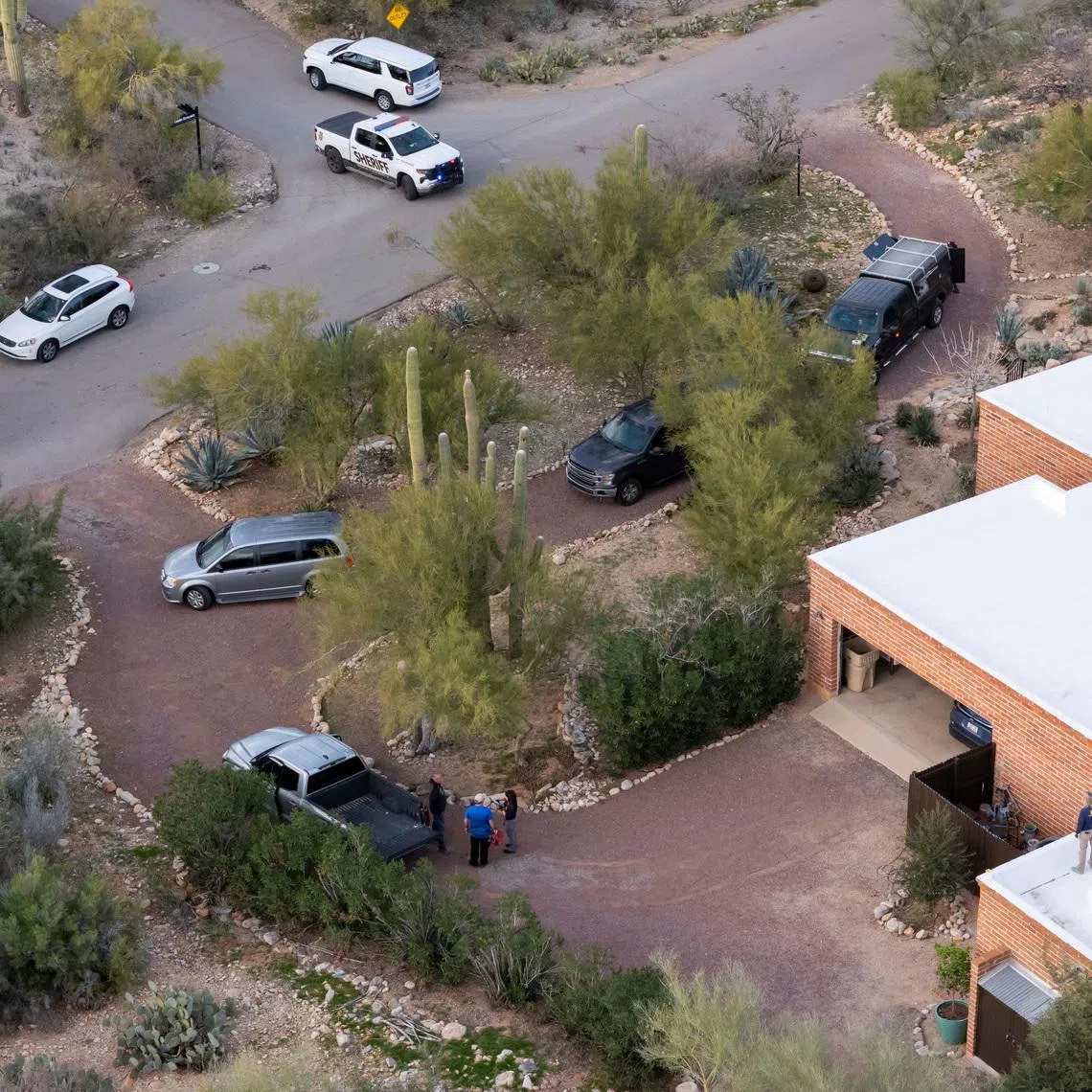 A drone view shows investigators searching the home of Ms Nancy Guthrie on Feb 6.