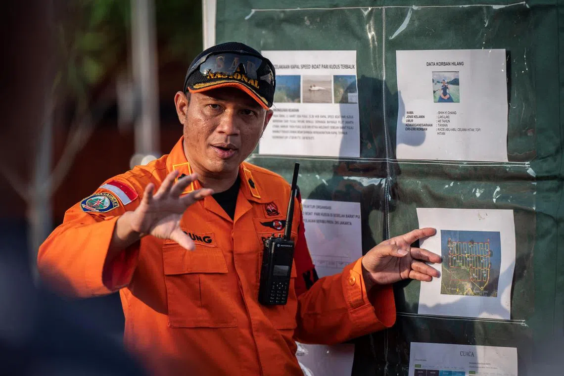 Head of operation of Jakarta's Search and Rescue agency Agung Priambodo delivers a brief during an operation after the Pari Kudus passenger boat capsized in the waters.