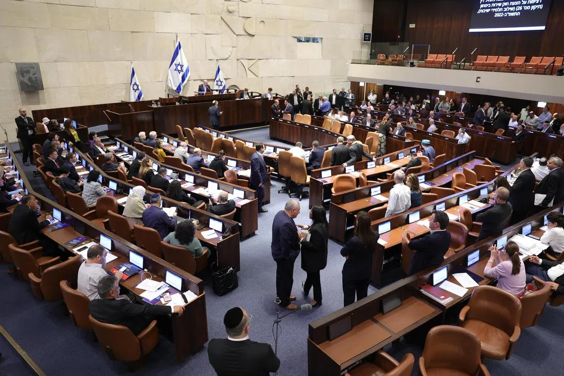 epa11403065 A view of the Knesset plenum vote on the ultra-Orthodox conscription to military service law, in the Knesset, Israeli parliament in Jerusalem, 10 June 2024. The Knesset vote on the controversial exemption for ultra-Orthodox Yeshiva students from military conscription. Israel’s Supreme Court heard on 02 June a response by the state over the ultra-Orthodox recruitment issue, after previously extending a deadline for the government to present a conscription plan for ultra-Orthodox Jews, who are traditionally exempt from military service.  EPA-EFE/ABIR SULTAN