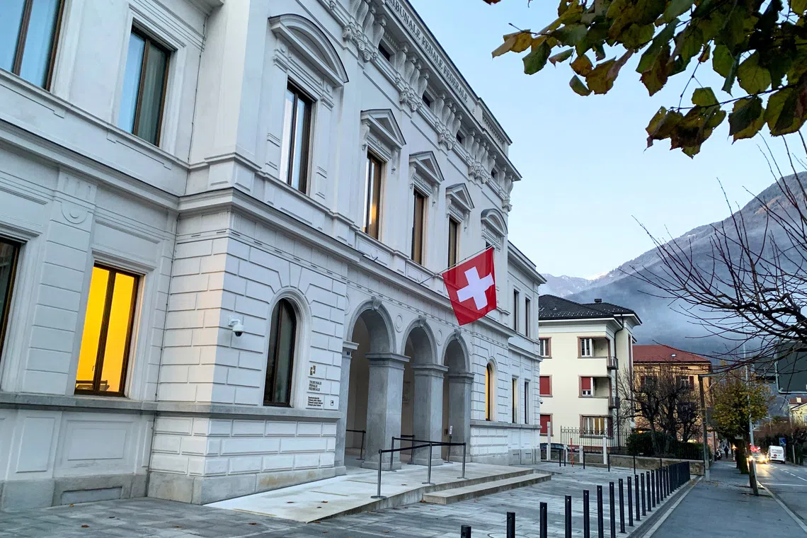 Switzerland's national flag is displayed on the Swiss Federal Criminal Court (Bundesstrafgericht) building in Bellinzona, Switzerland, December 3, 2020. REUTERS/Emma Farge