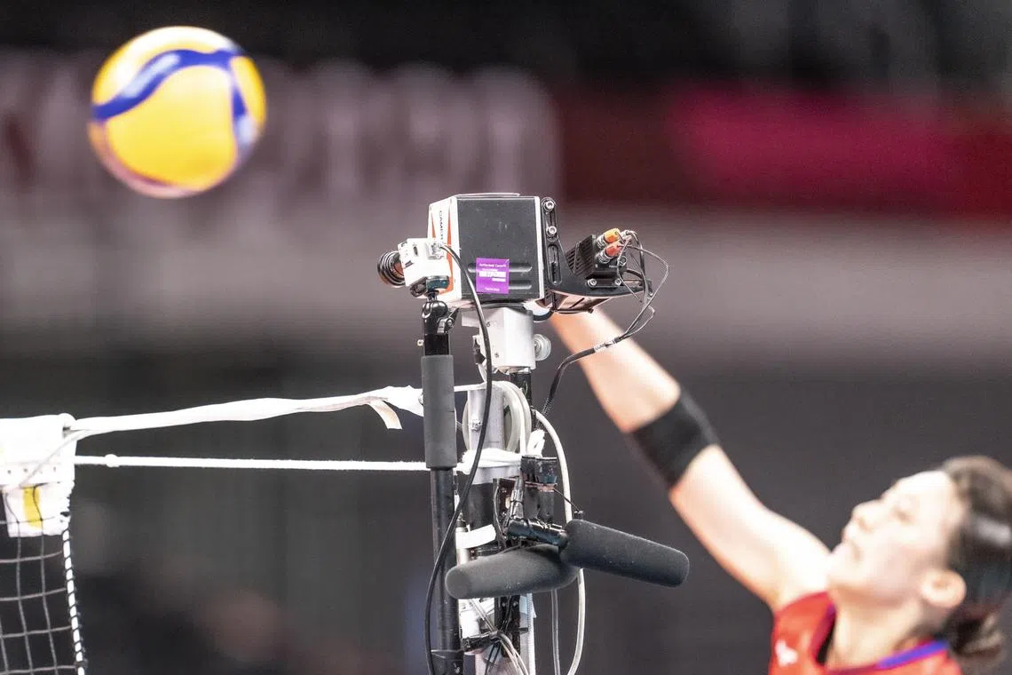 A microphone attached to the net will pick up the audible drama at the volleyball competition. 
