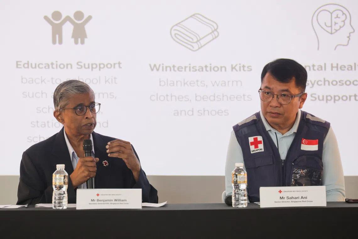SRC CEO Benjamin William (left) and senior director Sahari Ani speaking to the media at Red Cross House, on Sept 25.