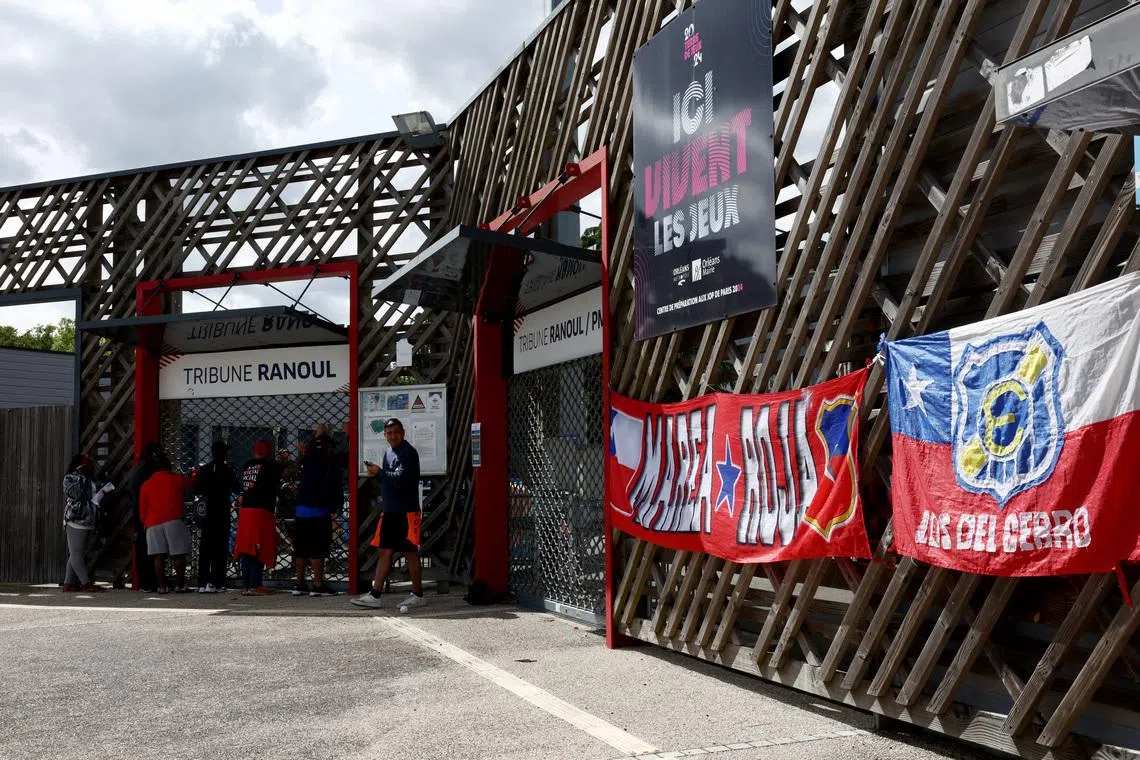 Soccer Football - International Friendly - DR Congo v Chile - Stade de la Source, Orleans, France - June 9, 2026 Fan gather outside the stadium before the match is played behind closed doors REUTERS/Tom Nicholson